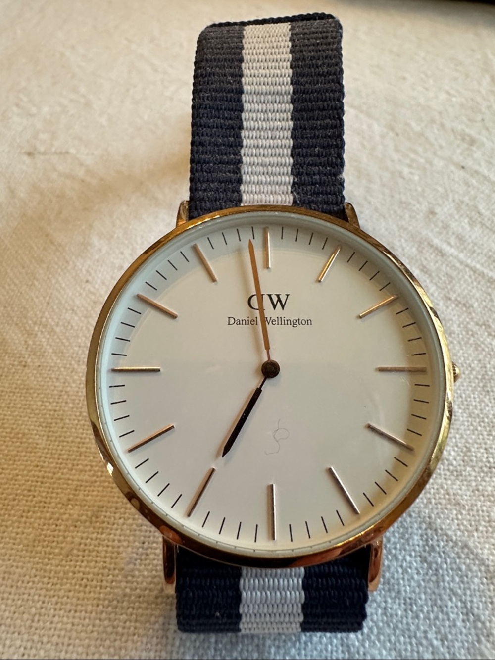 Daniel Wellington Gold Case Watch with Navy and White Strap